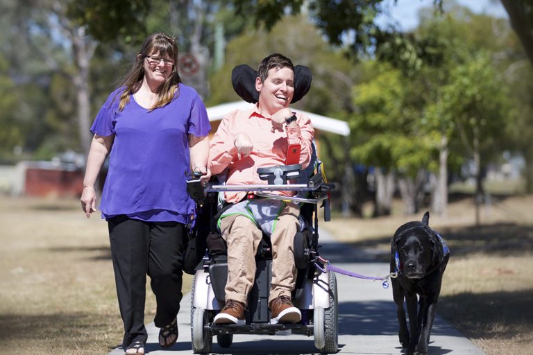 grant recipient Jason with his Mum and dog - Archie